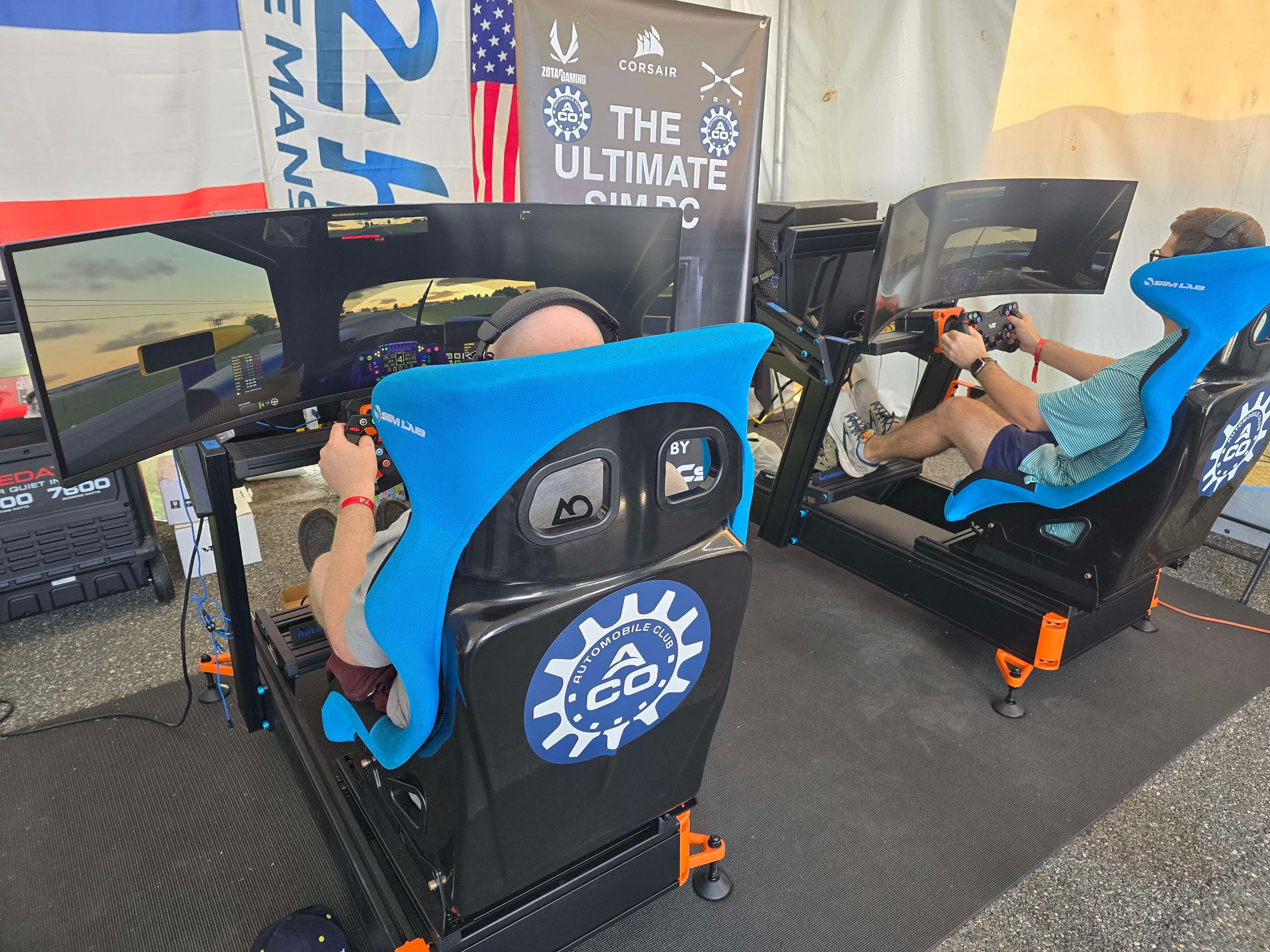 Motorsport-grade racing simulators with ultra-wide monitors in the ACO booth
